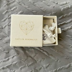 Initial “F” necklace.